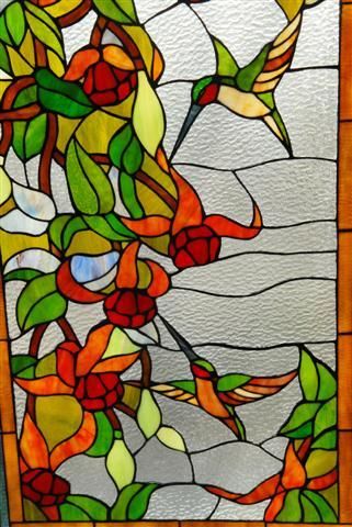Description Beautiful stained glass window or panel featuring 