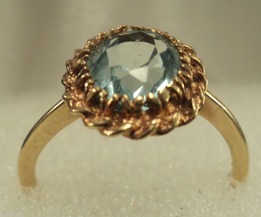   GOLD AND OVAL CUT 1.75ct (7MM X 9MM) AQUAMARINE RING SZ. 7  