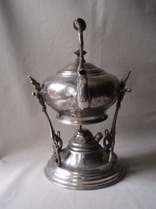 1930s) tea kettle. Made of metal, nickel plated. Consists of tea pot 